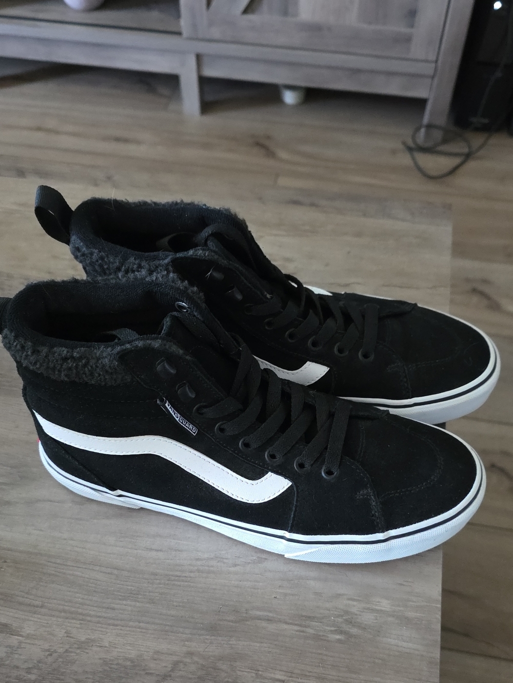 Vans Black and White High-Top Skate Sneakers